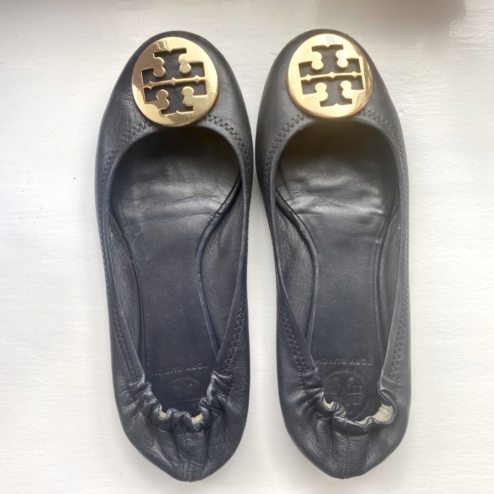 Tory Burch Navy Flats in good condition!
